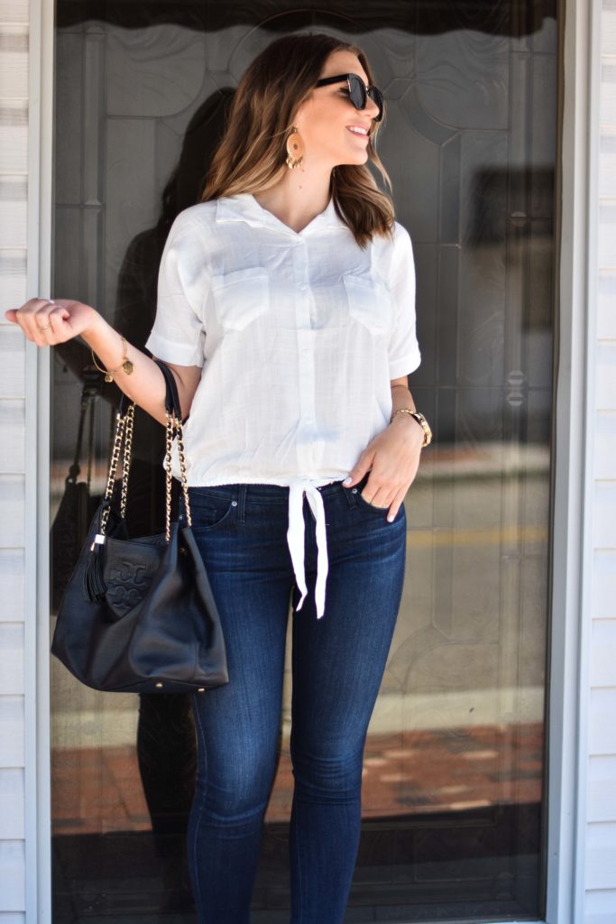white tie up top ag jeans tory burch bag