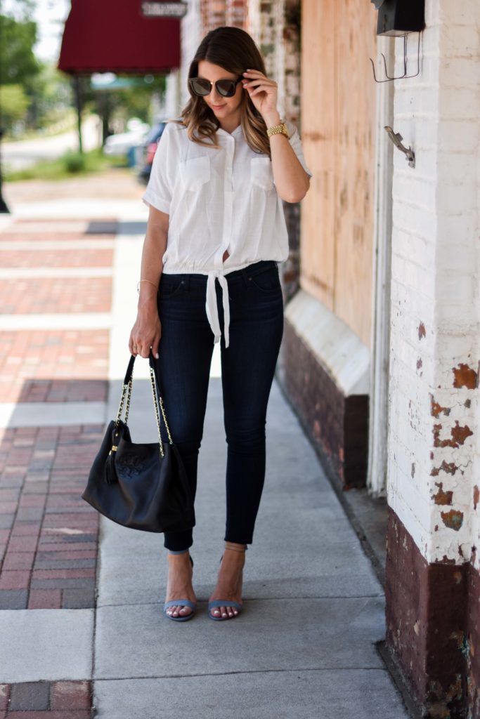 white tie up top ag jeans tory burch bag